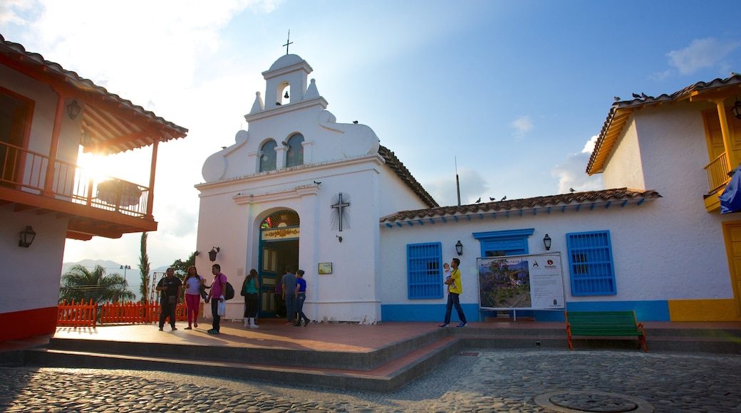 Pueblito Paisa showing religious elements and a church or cathedral