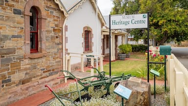 A stone building with a sign reading "Museum Heritage Centre".