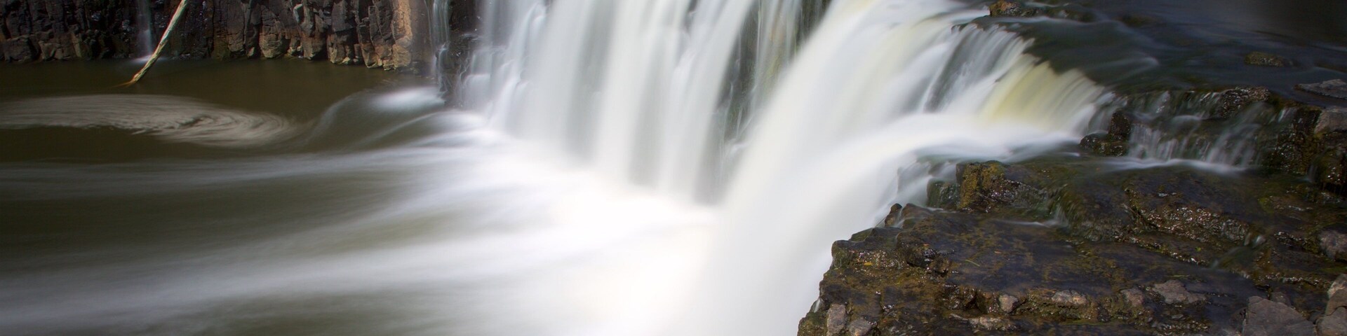 Haruru Falls showing a river or creek and a cascade