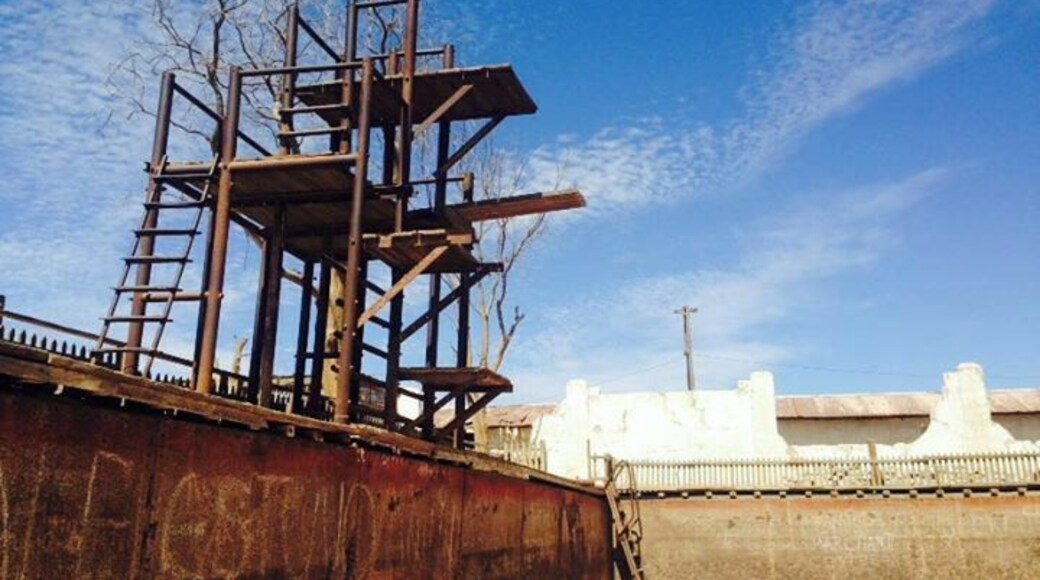The main plaza of the deserted mining town Humberstone. About 30 minute bus ride from Iquique. Buses leave from Mercado centenario and cost 2000 pesos. They leave you right next to the town and you can spend hours and hours exploring the buildings and artifacts found in the town. Buses leave every 20 min.