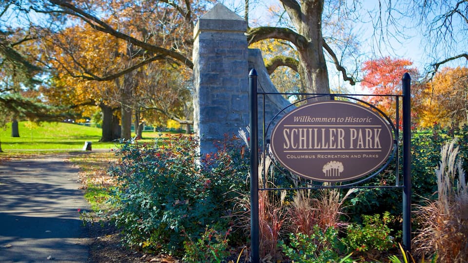 Schiller Park showing signage and a garden