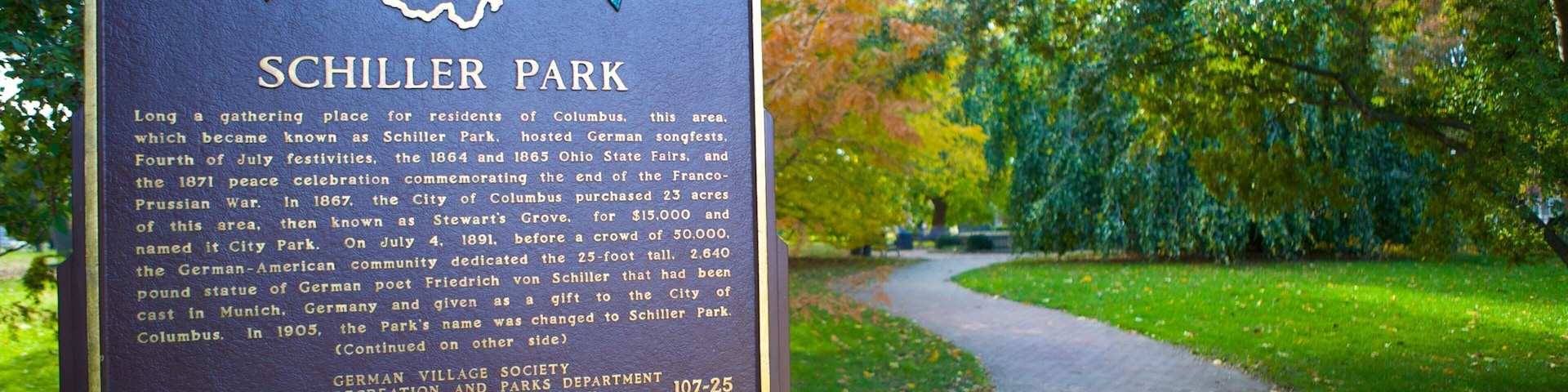 Schiller Park showing a garden and signage