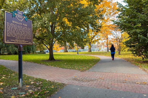Schiller Park which includes a garden, signage and fall colors