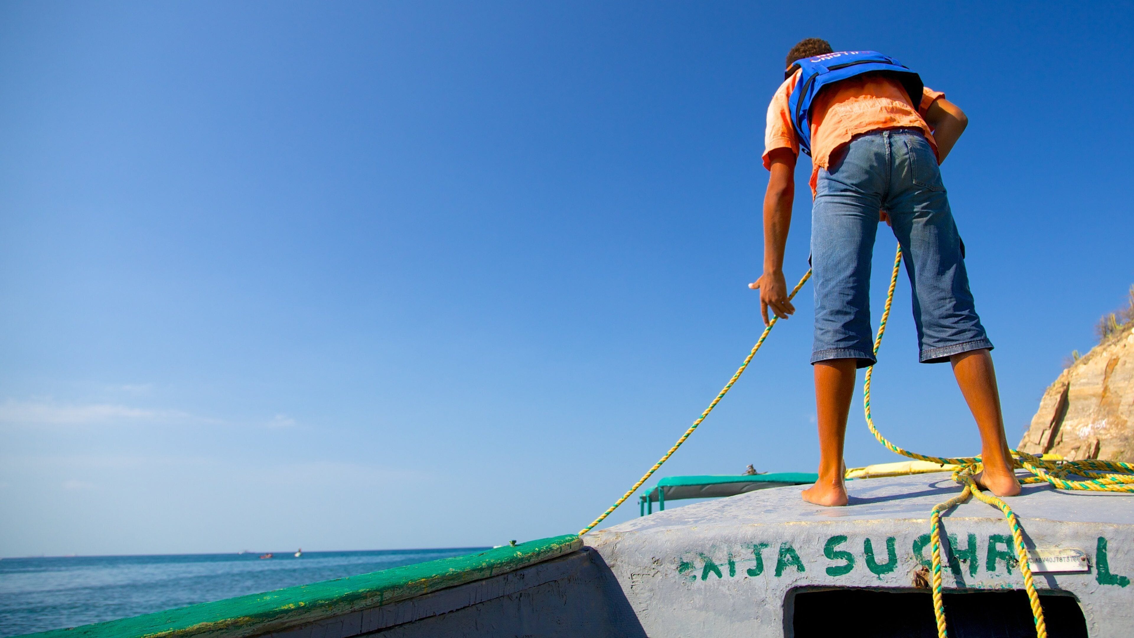 Spiaggia Blanca mostrando pesca cosi come ragazzo