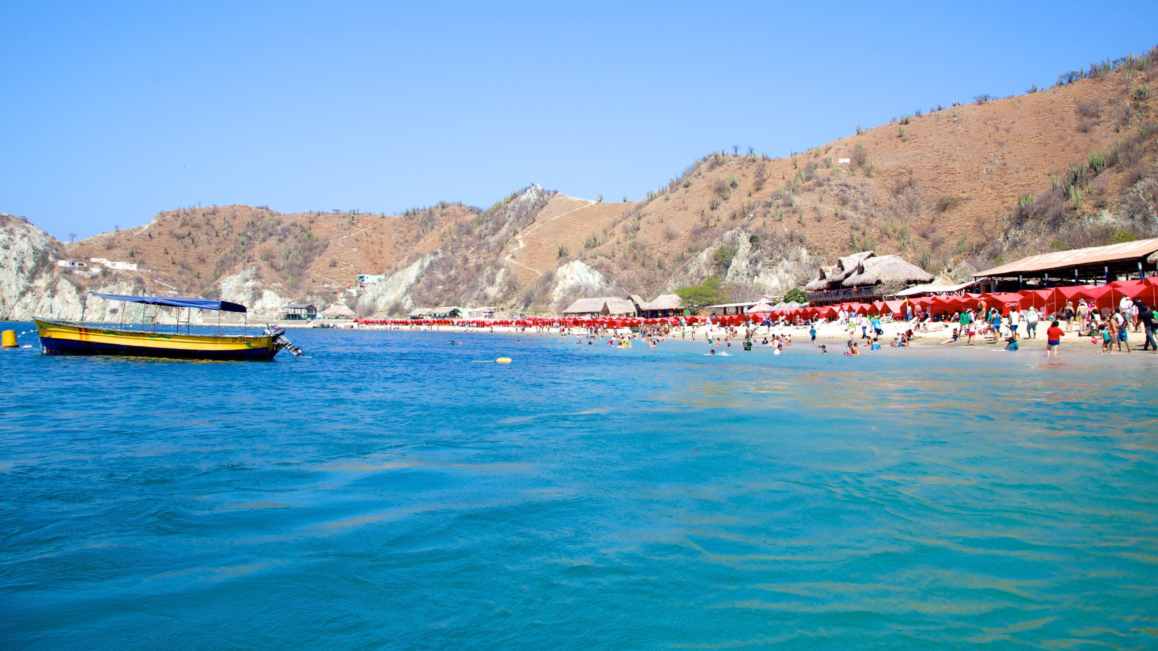 Blanca Beach which includes a bay or harbour, landscape views and a beach