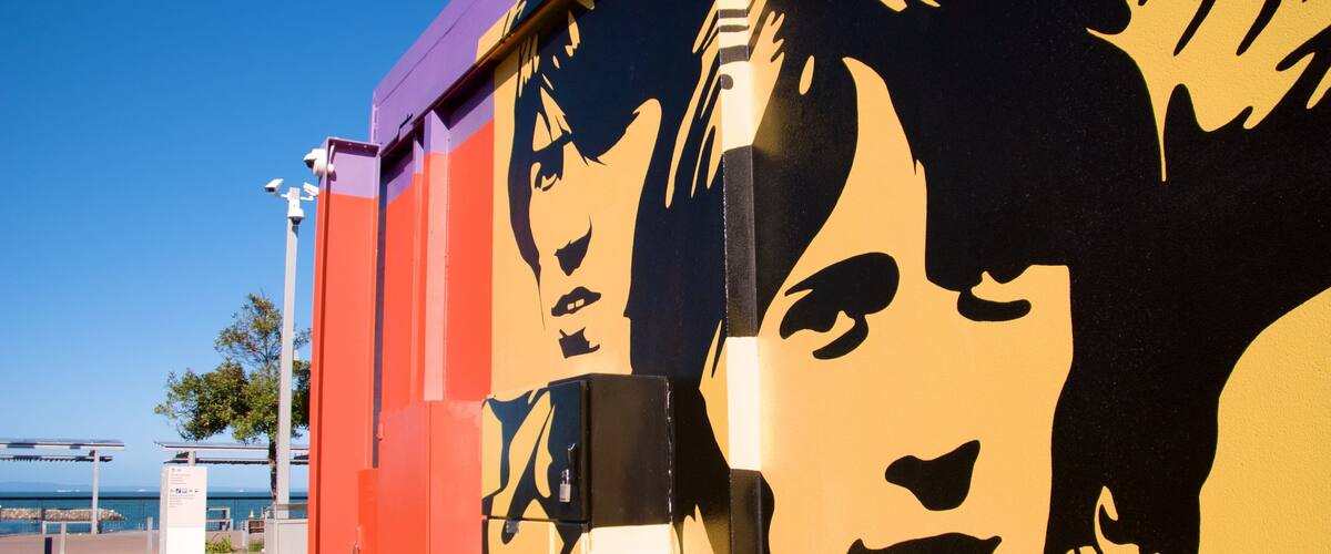 Bee Gees Way which includes general coastal views and outdoor art