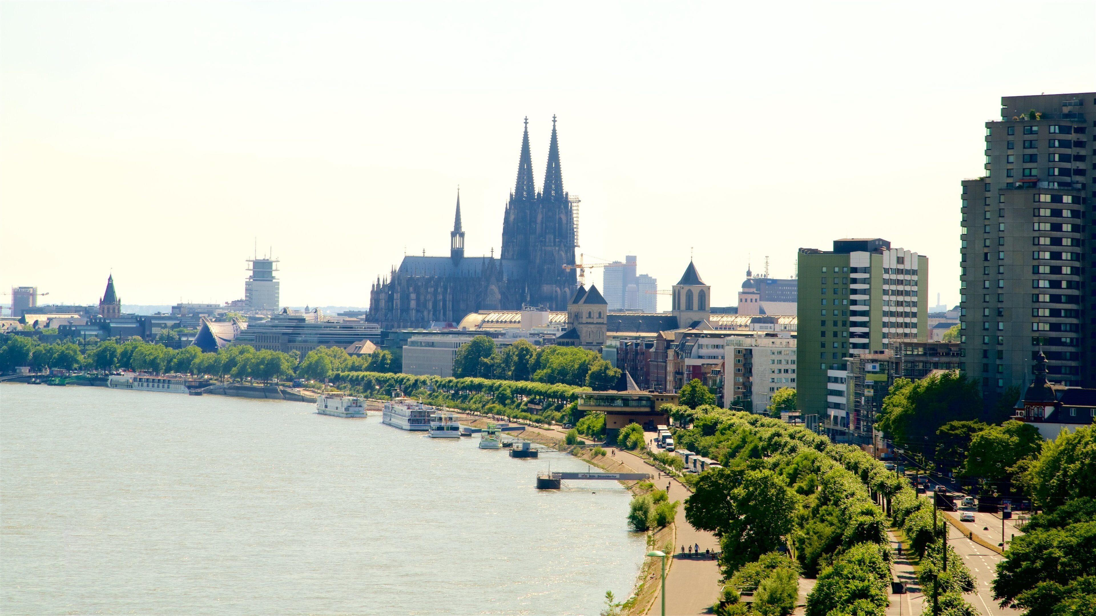 Cologne Cable Car featuring a city, a skyscraper and a river or creek