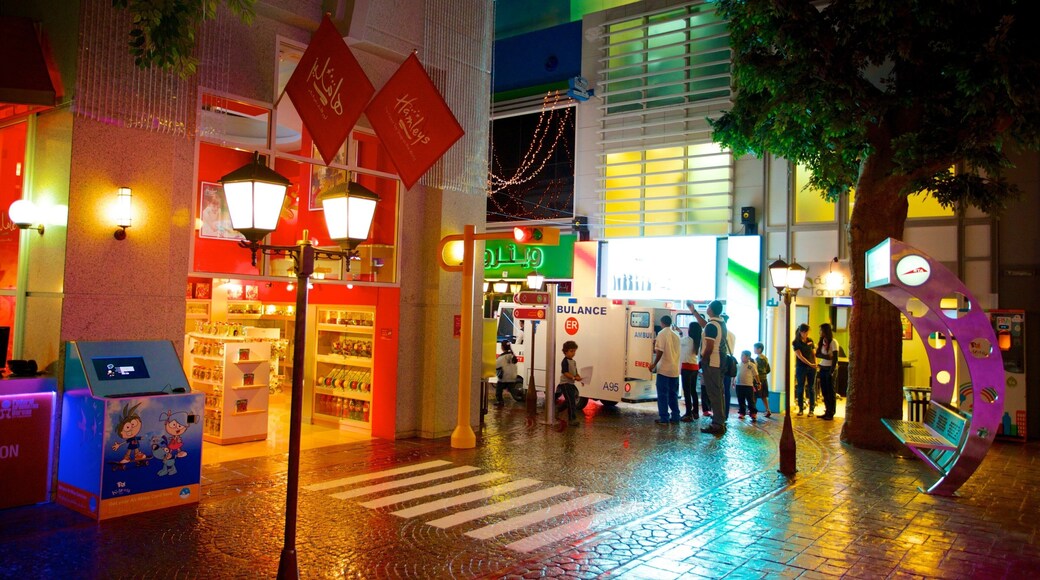 KidZania showing night scenes, rides and street scenes