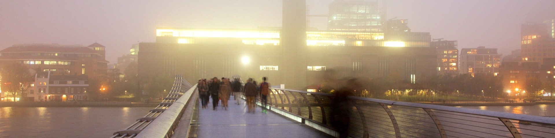 London Millennium Footbridge showing a city, mist or fog and a river or creek