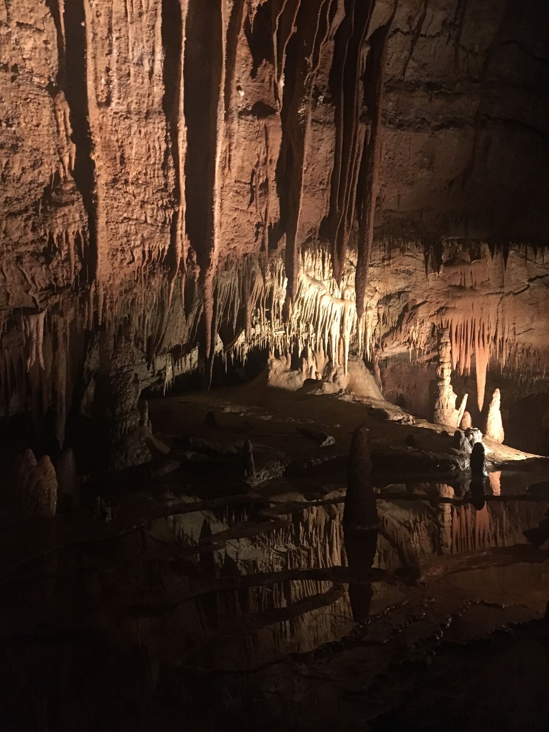 A cave with stalactites and stalagmites.