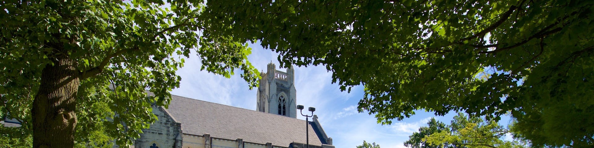 College of the Ozarks showing heritage architecture, a garden and a church or cathedral