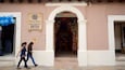 A building with a sign reading "Museo del Jade" and a smaller sign for "La Casa del Jade Museo-Joyeria-Taller".