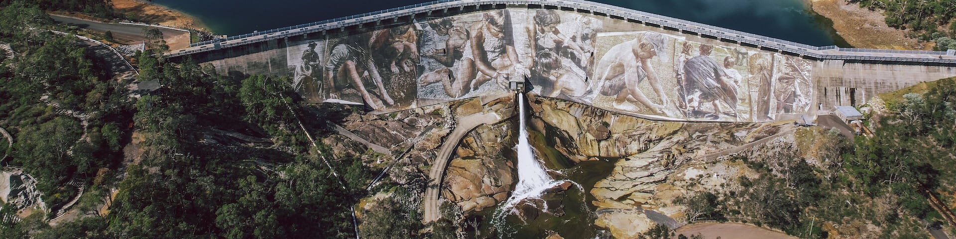 View of mural artwork on a dam wall in Wellington National Park near Collie in Western Australia