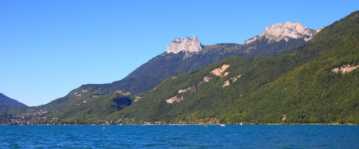 A lake with a mountain in the background.
