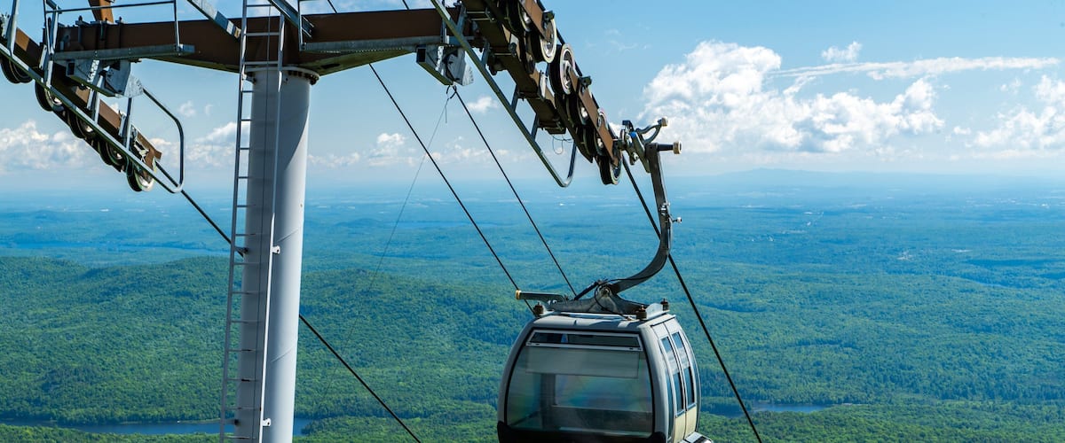 Mont Orford Ski Area featuring a gondola and tranquil scenes