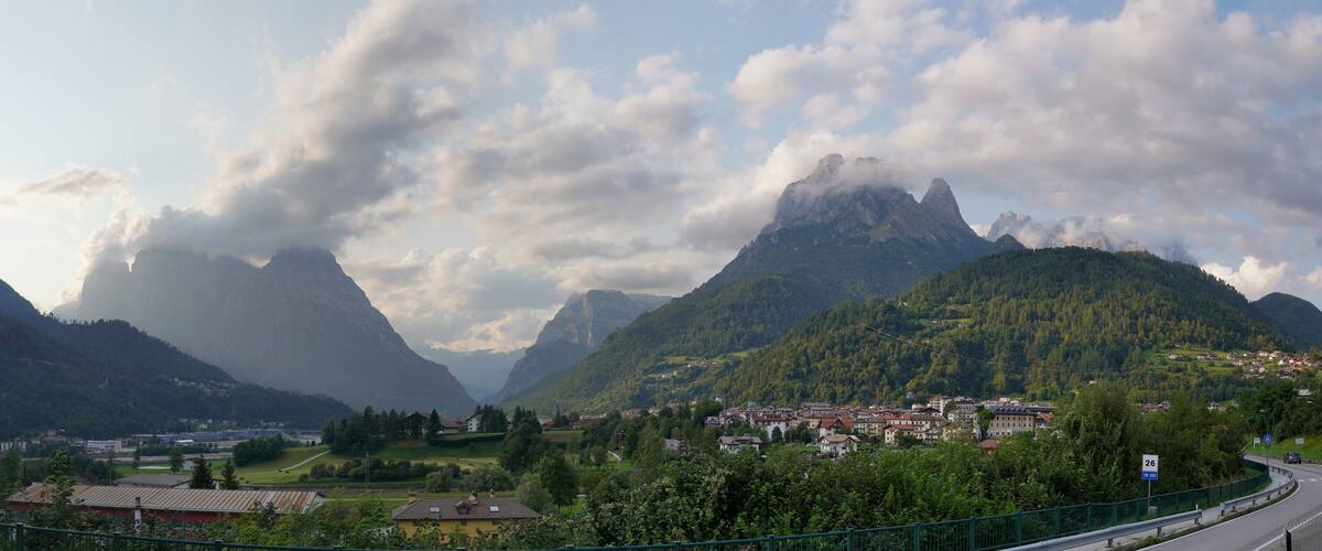 A mountainous landscape with a town nestled among the hills.