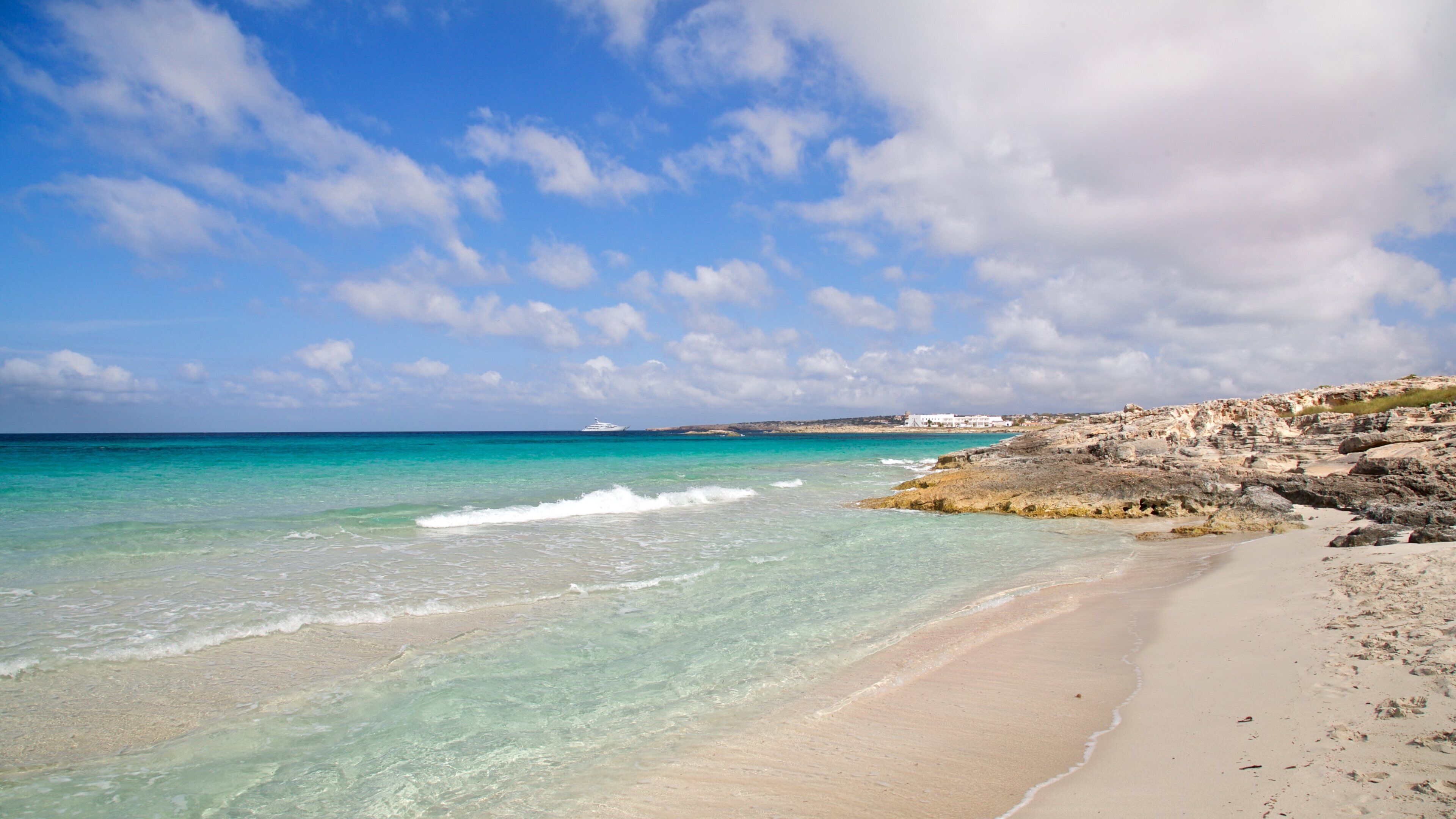 Sa Roqueta Beach featuring general coastal views, rugged coastline and a beach