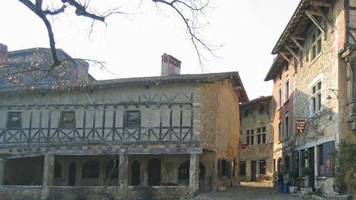 medieval place with typical old houses, perouges, france, panora
