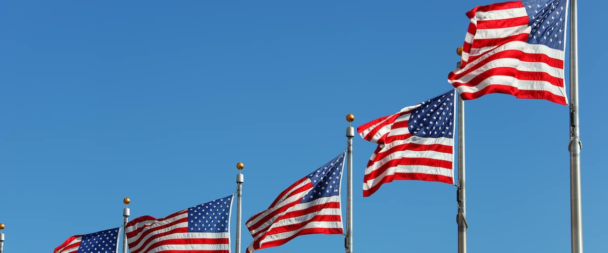 USA Flags at the Washington Monument blowing in the wind