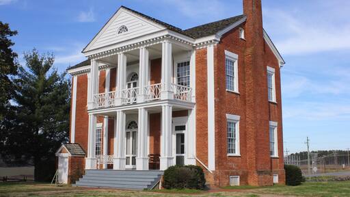 During the 1790s, James Vann became a Cherokee Indian leader and wealthy businessman. He established the largest and most prosperous plantation in the Cherokee Nation, covering 1,000 acres of what is now Murray County. In 1804 he completed construction of a beautiful 2 ½-story brick home that was the most elegant in the Cherokee Nation. After Vann was murdered in 1809, his son Joseph inherited the mansion and plantation. Joseph was also a Cherokee leader and became even more wealthy than his father.
In the 1830s almost the entire Cherokee Nation was forced west by state and federal troops on the infamous Trail of Tears. The Vann family lost their elegant home, rebuilding in the Cherokee Territory of Oklahoma. Today the Vann House survives as Georgia’s best-preserved historic Cherokee Indian home. A guided tour allows visitors to see the house which features beautiful hand carvings, a remarkable “floating” staircase, a 12-foot mantle and fine antiques.