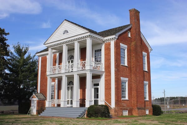 During the 1790s, James Vann became a Cherokee Indian leader and wealthy businessman. He established the largest and most prosperous plantation in the Cherokee Nation, covering 1,000 acres of what is now Murray County. In 1804 he completed construction of a beautiful 2 ½-story brick home that was the most elegant in the Cherokee Nation. After Vann was murdered in 1809, his son Joseph inherited the mansion and plantation. Joseph was also a Cherokee leader and became even more wealthy than his father.
In the 1830s almost the entire Cherokee Nation was forced west by state and federal troops on the infamous Trail of Tears. The Vann family lost their elegant home, rebuilding in the Cherokee Territory of Oklahoma. Today the Vann House survives as Georgia’s best-preserved historic Cherokee Indian home. A guided tour allows visitors to see the house which features beautiful hand carvings, a remarkable “floating” staircase, a 12-foot mantle and fine antiques.