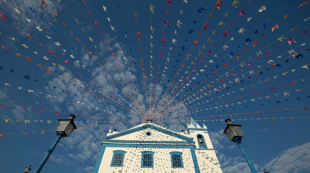 Church of Our Lady of Help, or Nossa Senhora d Ajuda in portuguese, decorated with June festival flags. Ilhabela, colonial town on the coast of Sao Paulo state, Brazil