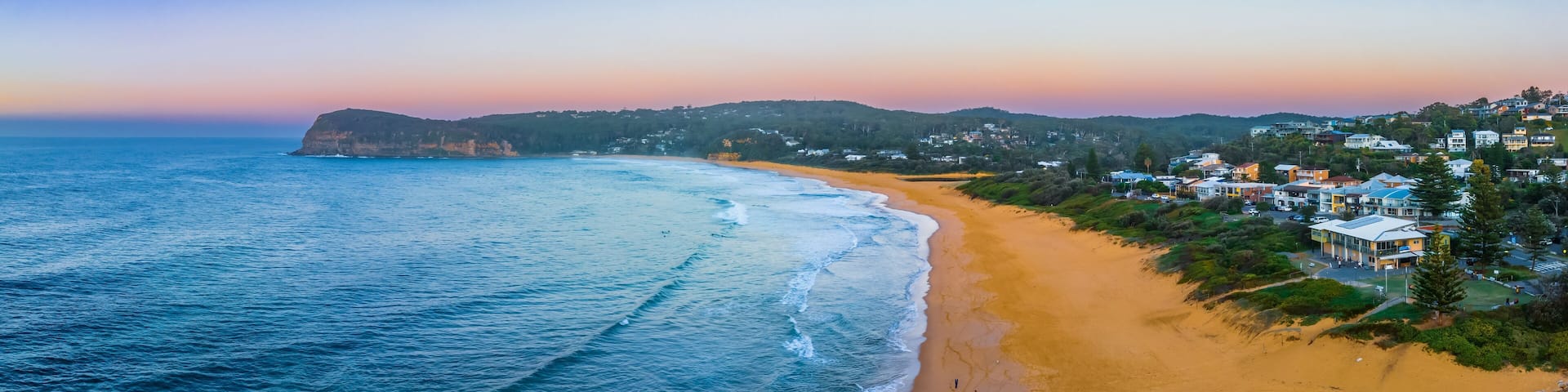 Aerial sunrise panorama at the seaside with a hazy clear sky