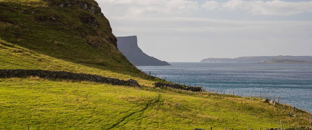 Torr Head which includes rugged coastline and general coastal views