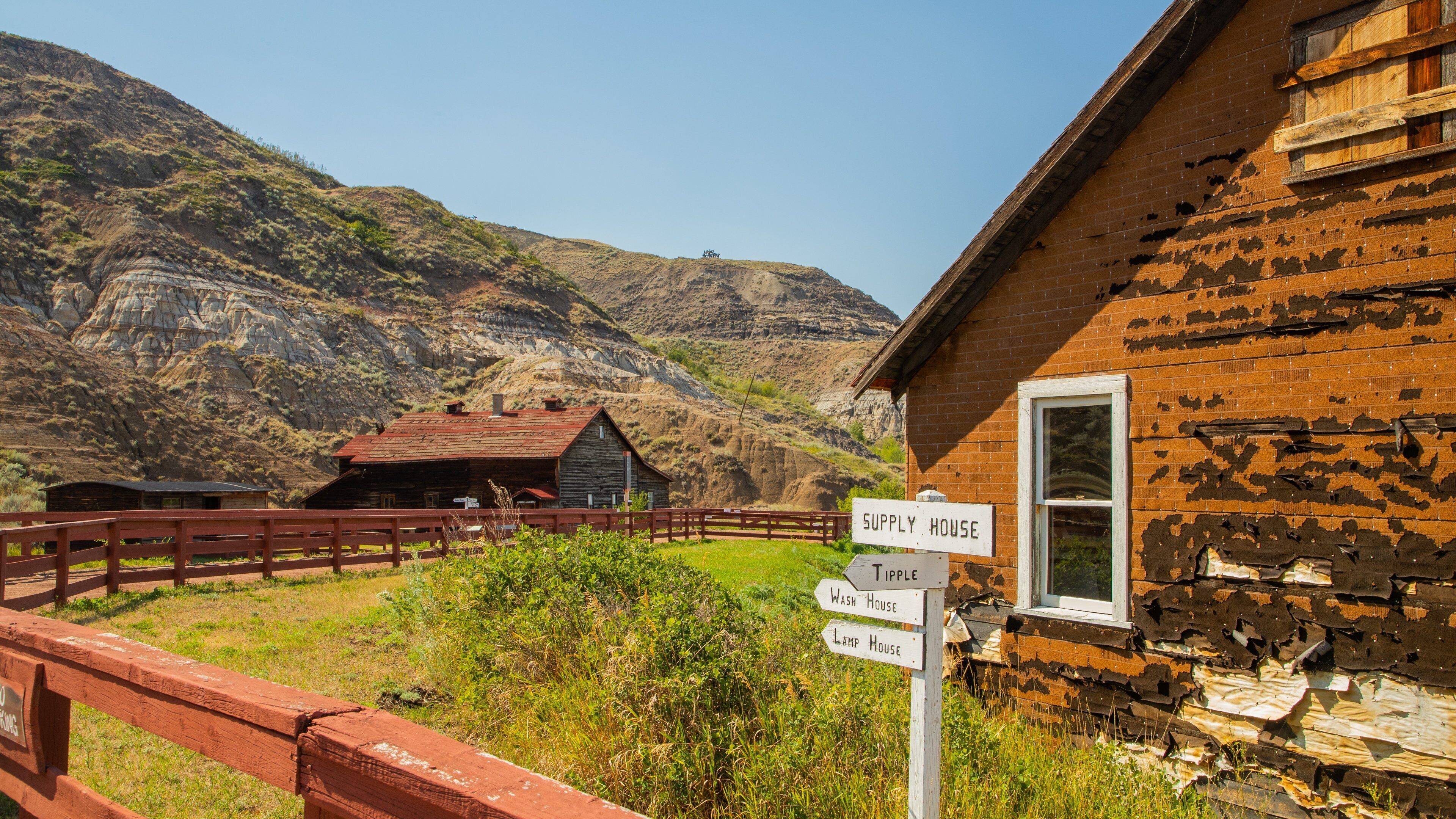 Atlas Coal Mine National Historic Site featuring a small town or village, signage and farmland