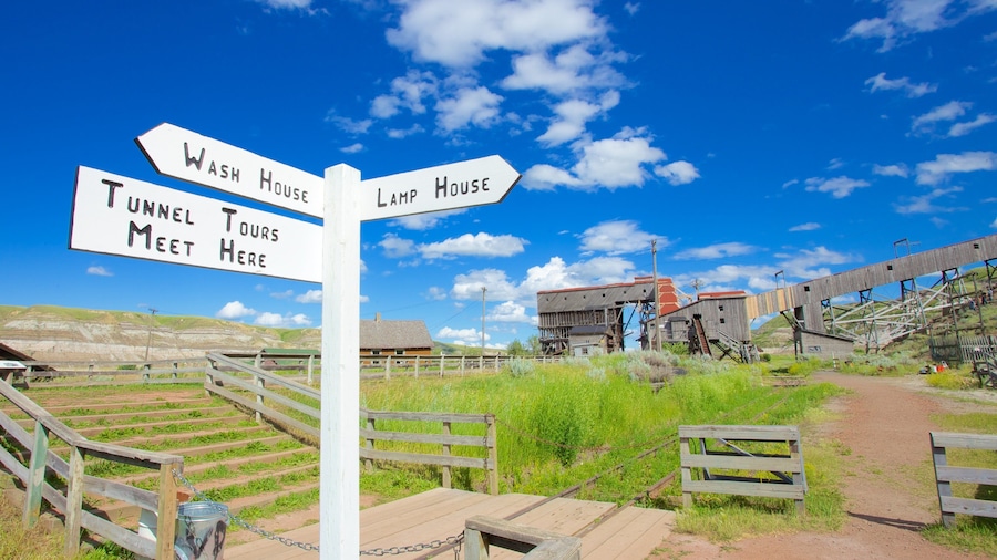 Atlas Coal Mine which includes signage, tranquil scenes and industrial elements