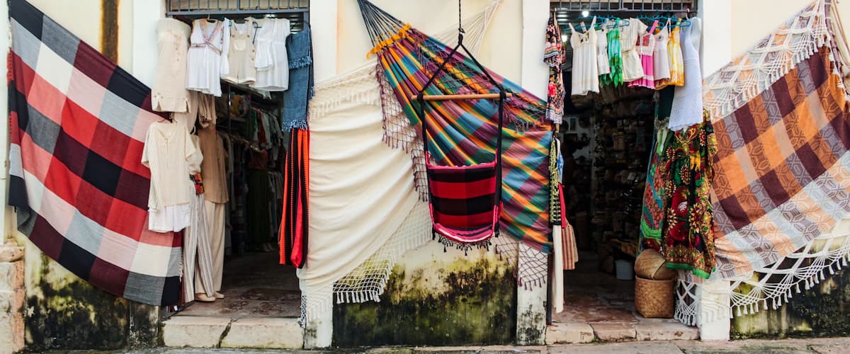 São Luís MA, Brazil, May 2023. Facade of a crafts bazaar, with colorful nets and other souvenirs for sale to tourists, in the historic center of the city of São Luis, Maranhão, northeast Brazil