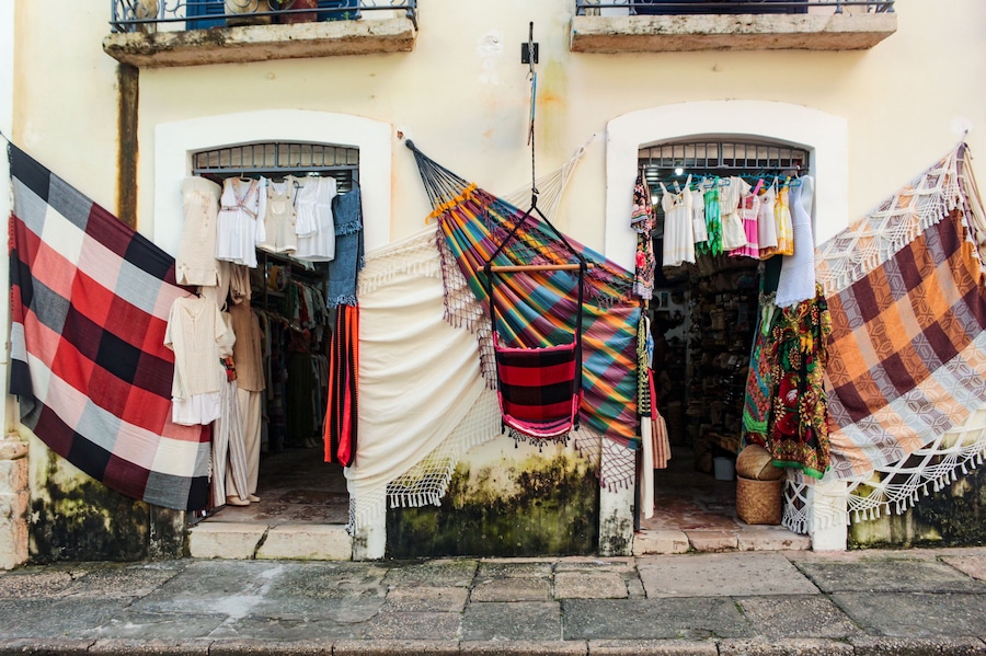 São Luís MA, Brazil, May 2023. Facade of a crafts bazaar, with colorful nets and other souvenirs for sale to tourists, in the historic center of the city of São Luis, Maranhão, northeast Brazil