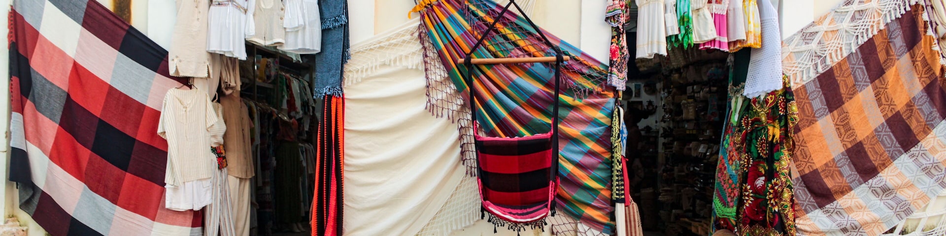 São Luís MA, Brazil, May 2023. Facade of a crafts bazaar, with colorful nets and other souvenirs for sale to tourists, in the historic center of the city of São Luis, Maranhão, northeast Brazil