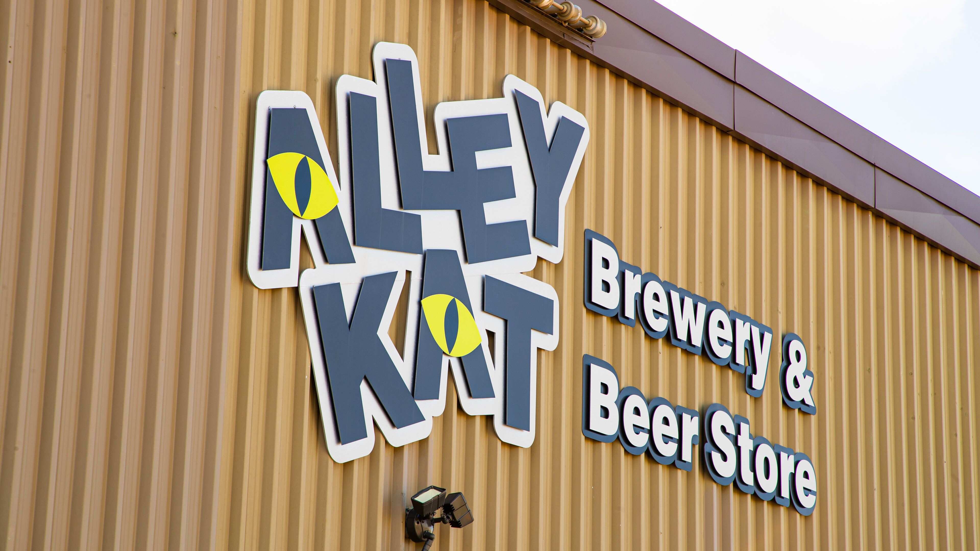 Alley Kat Brewery featuring signage