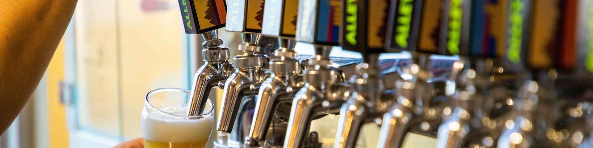 Alley Kat Brewery which includes drinks or beverages and a bar