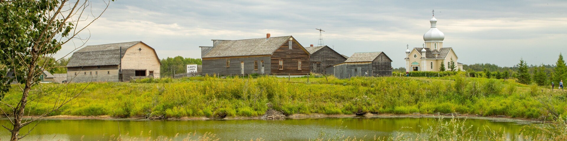 Ukrainian Cultural Heritage Village which includes a small town or village and a pond