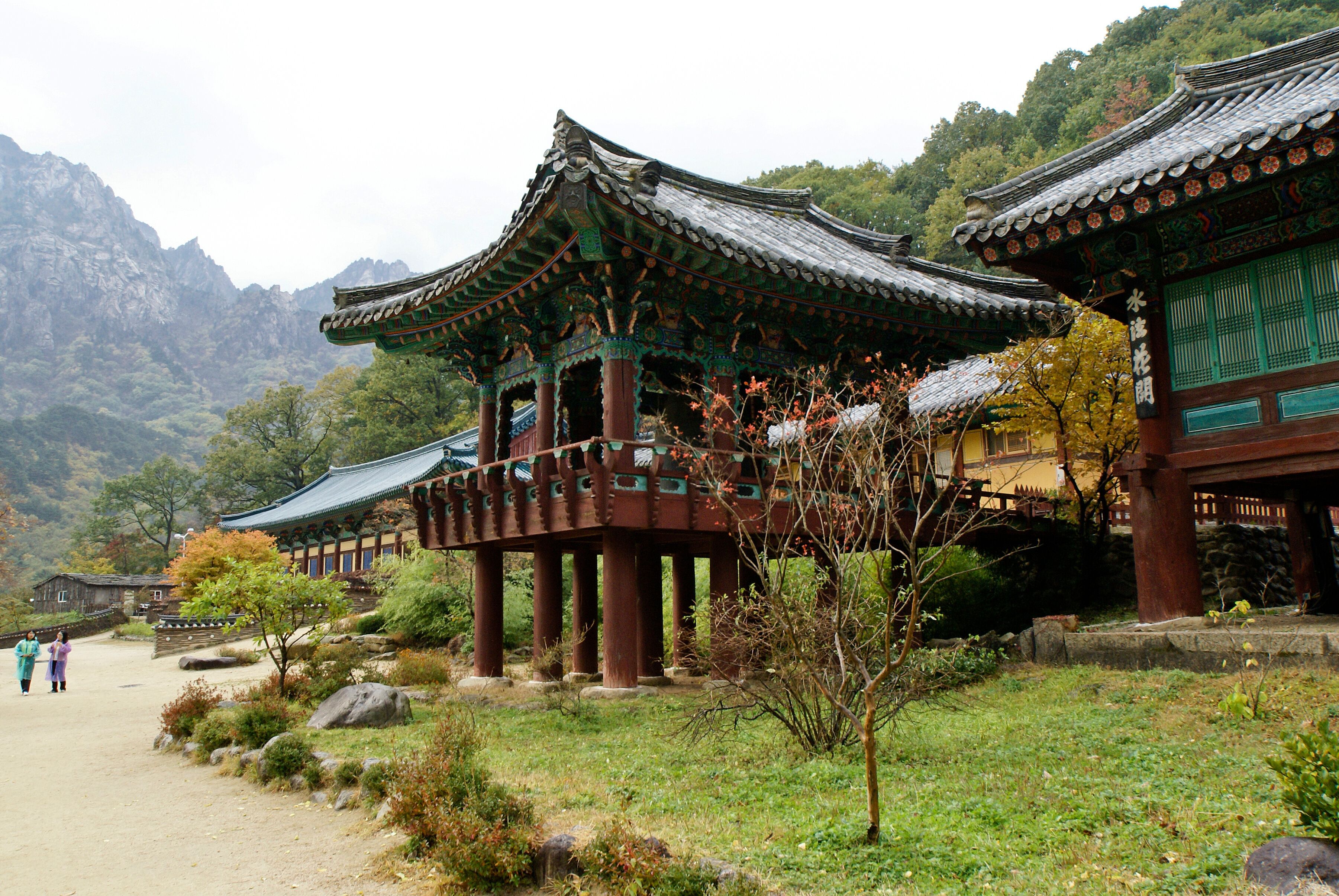 Granite spires serve as a dramatic backdrop to the lovely Shinheungsa Buddhist temple in Seoraksan National Park, South Korea.