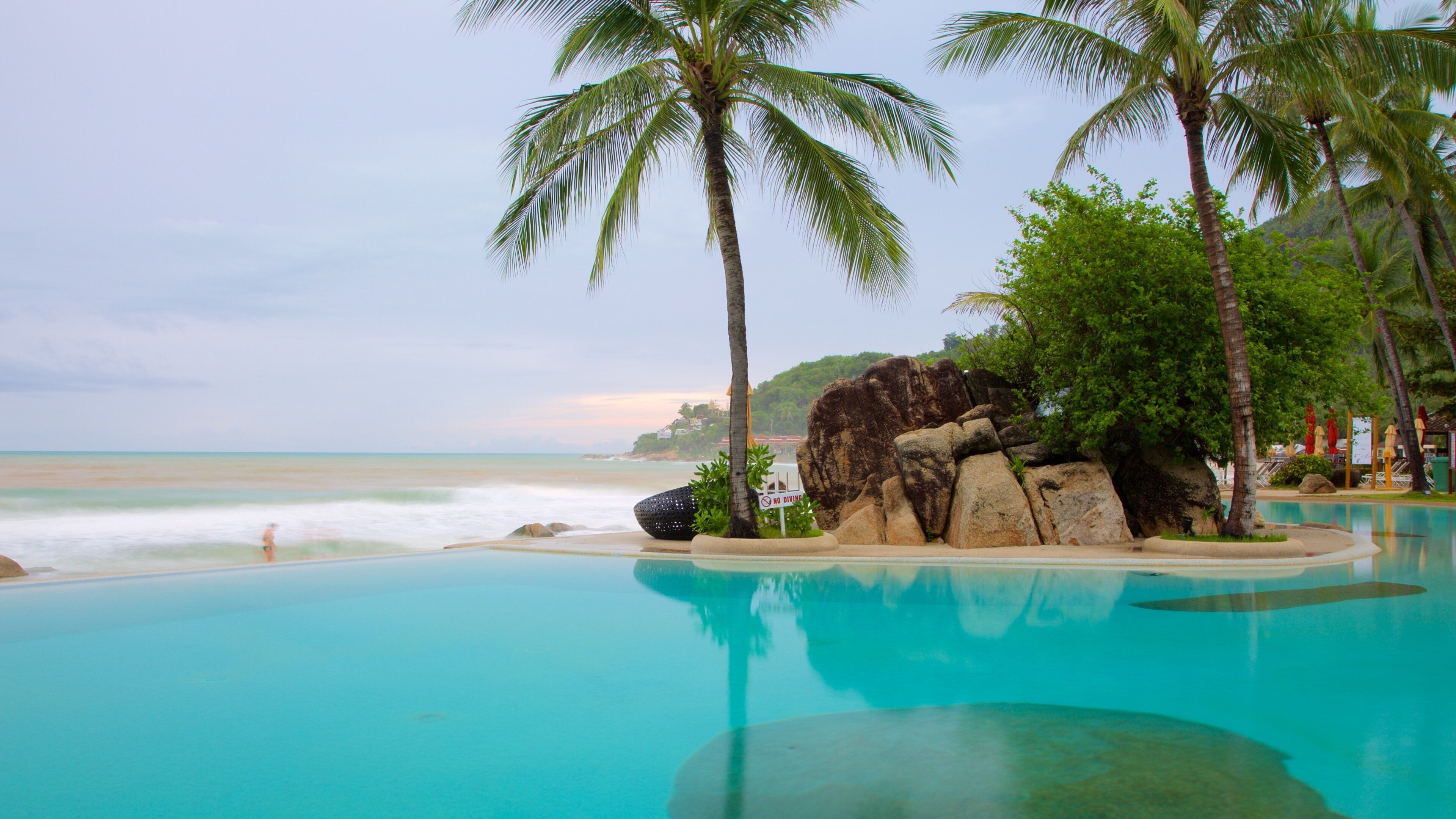 Silver Beach showing general coastal views, a luxury hotel or resort and a pool