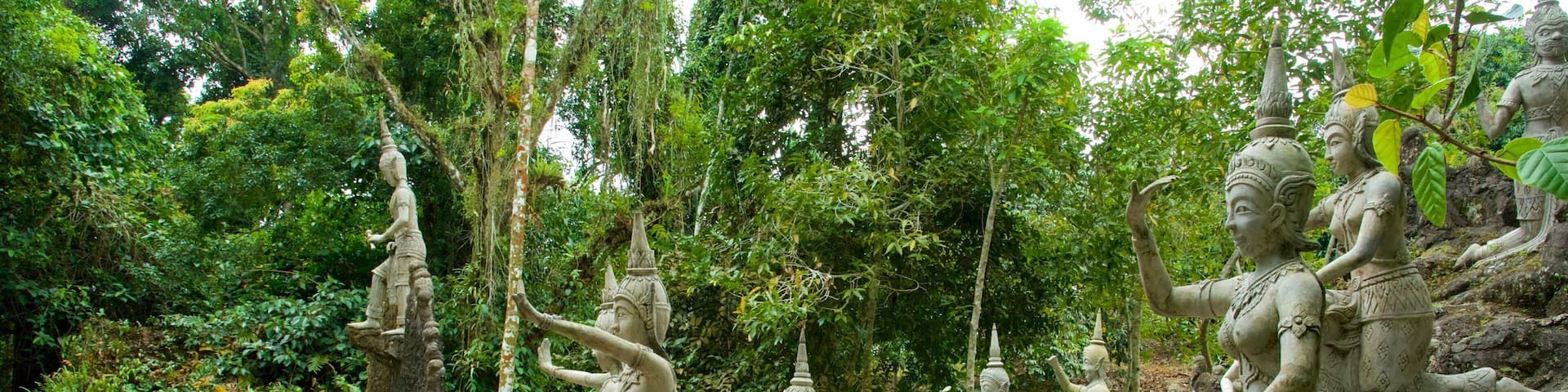 Secret Buddha Garden which includes a park and a statue or sculpture