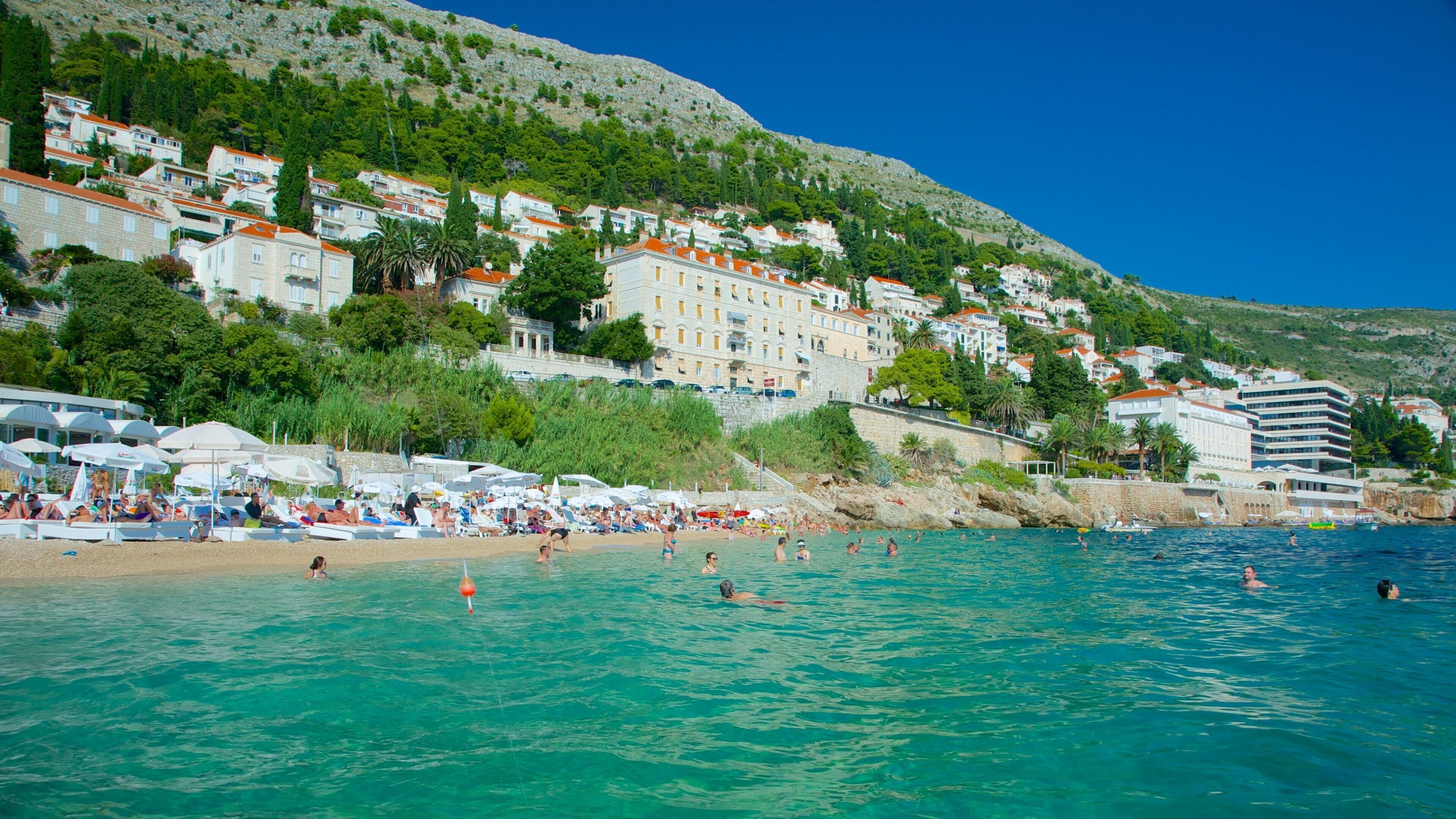 Banje Beach featuring a coastal town and a beach