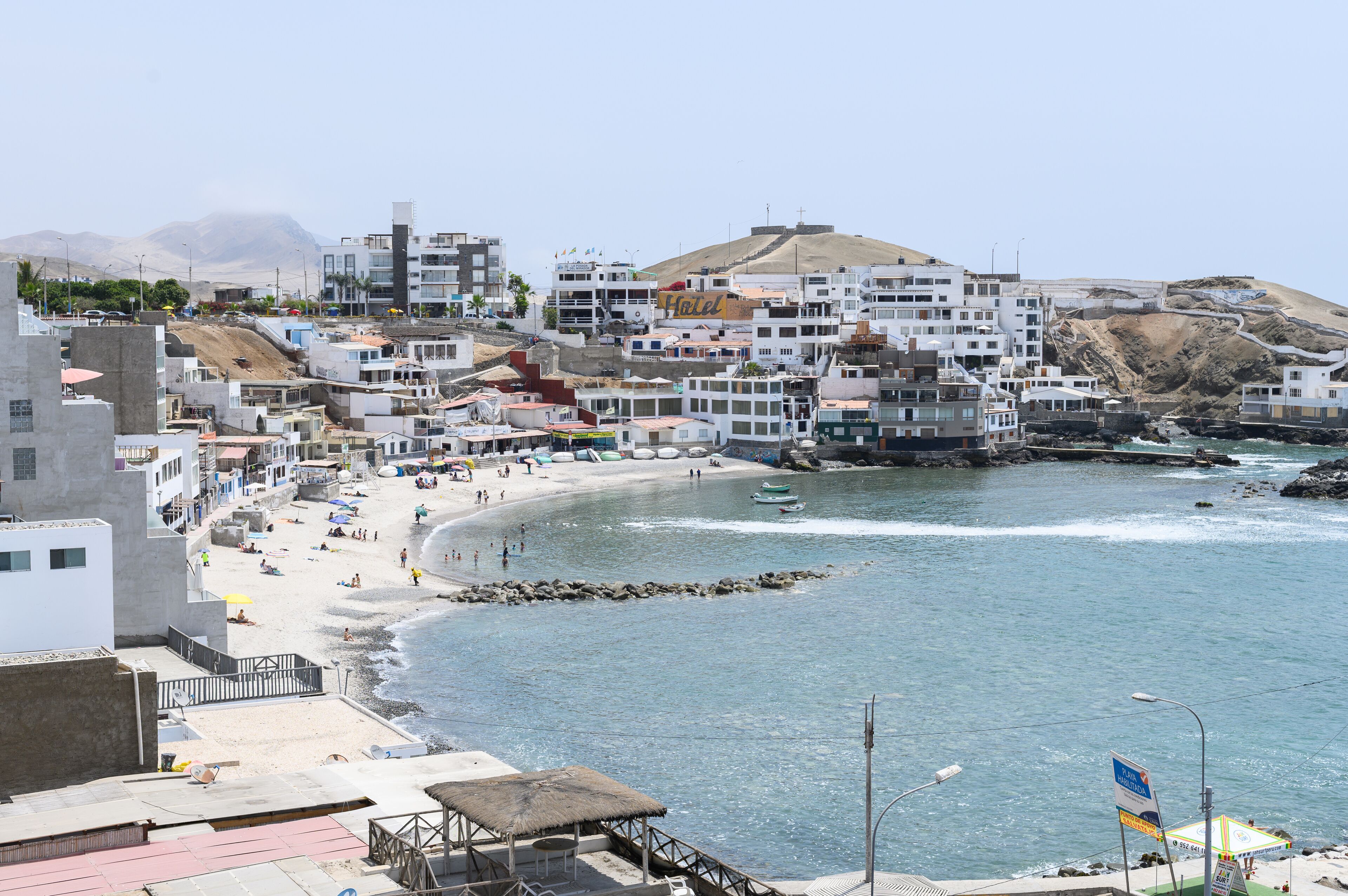 View of San Bartolo's North Beach on a sunny day, located along the southern coast of Lima, Peru