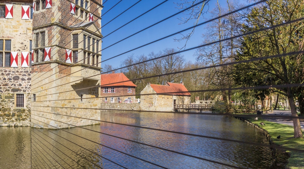 Panorama of Burg Vischering reflected in the mirror in Ludinghausen, Germany