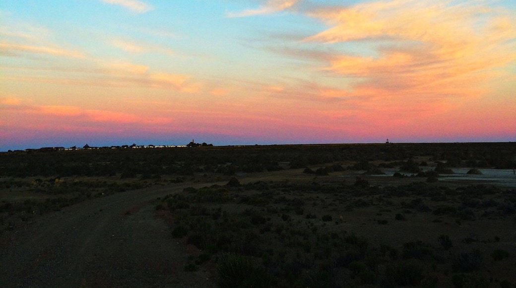 Get away from the world at Bahia Bustamante on the Argentinian coast, an old seaweed town come sheep estancia come small hotel. With a private penguin colony, petrified forest, horse rides along the beach and sunsets like this to yourself, this place is unforgettable.
http://www.nytimes.com/2011/03/06/travel/06bahia-bustamante.html?_r=0
