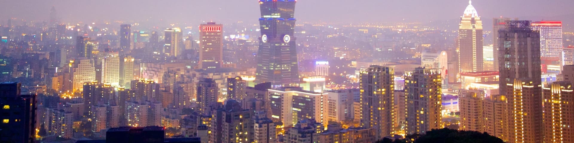 Taipei which includes a sunset, a city and city views