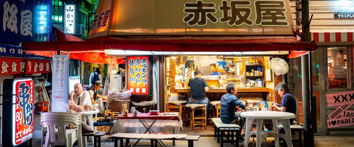 Shinsekai featuring night scenes, street scenes and outdoor eating