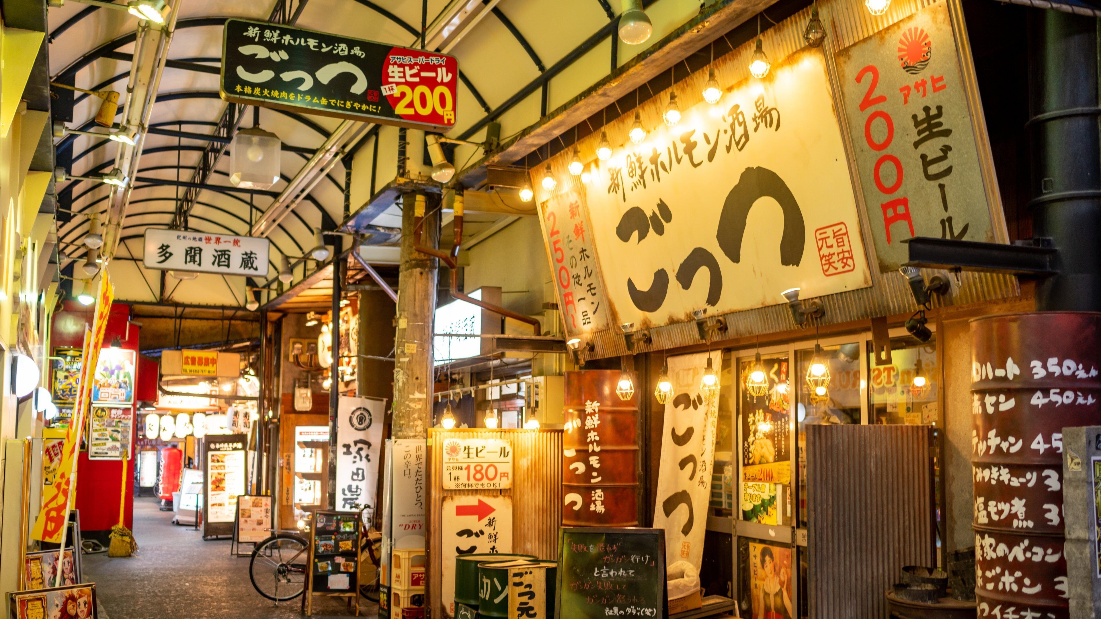 Tenjimbashi-Suji Shopping Street which includes interior views and signage