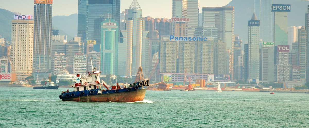 Tsim Sha Tsui Promenade which includes a bay or harbor, boating and city views