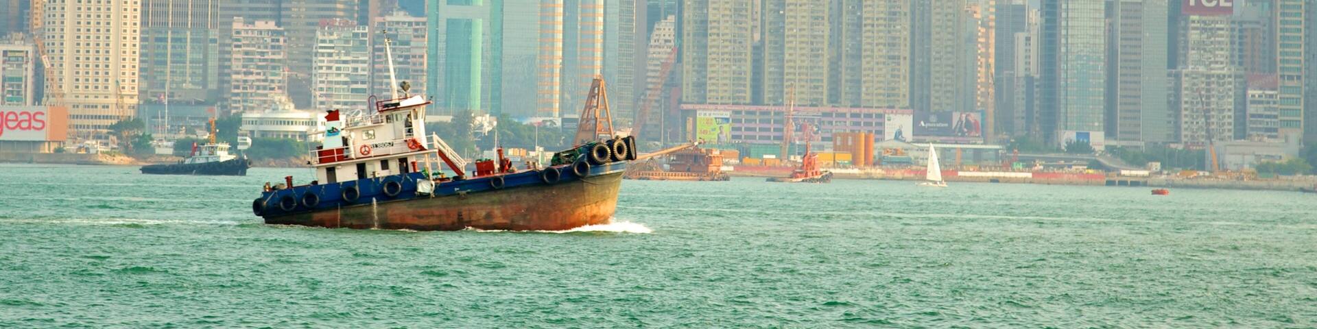 Tsim Sha Tsui Promenade which includes a bay or harbor, boating and city views