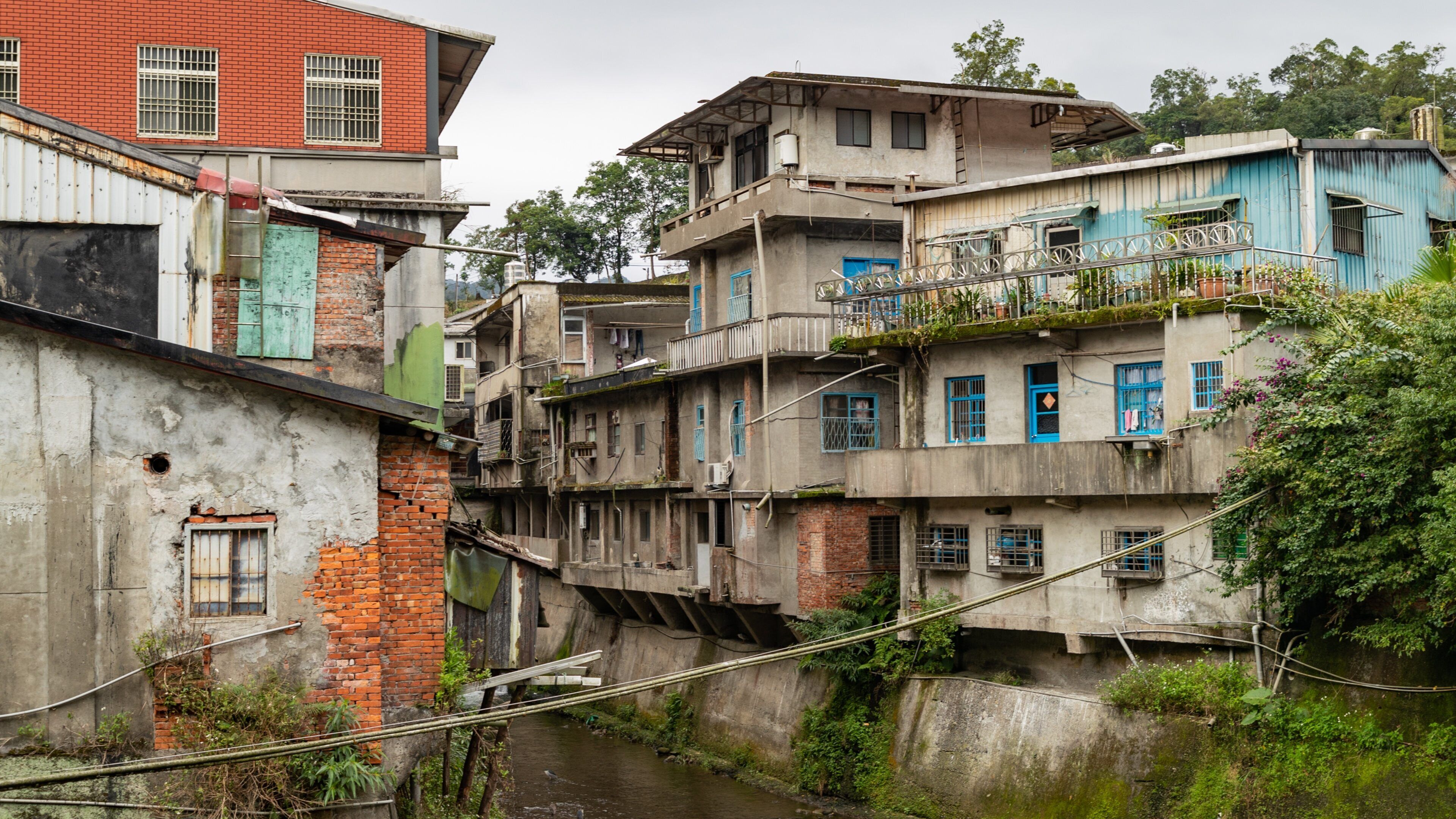 Pingxi District which includes a river or creek and a small town or village