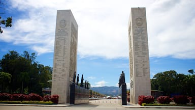 A monument with inscriptions and statues.